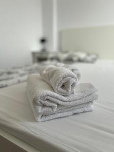 Ένα ή περισσότερα κρεβάτια σε δωμάτιο στο White citadel apartment
