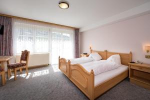 Postel nebo postele na pokoji v ubytování Hotel- Restaurant Krone
