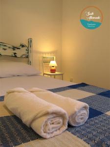 Ένα ή περισσότερα κρεβάτια σε δωμάτιο στο Suíte Alvorada Tiradentes MG