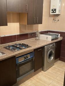 Η κουζίνα ή μικρή κουζίνα στο Appartement Yasmine à Martil