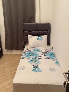 Ένα ή περισσότερα κρεβάτια σε δωμάτιο στο Appartement Yasmine à Martil