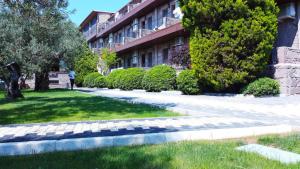 A garden outside Assos Park Hotel