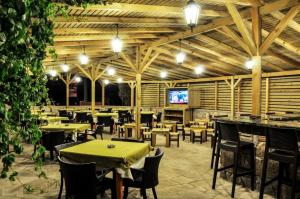 A restaurant or other place to eat at Assos Park Hotel