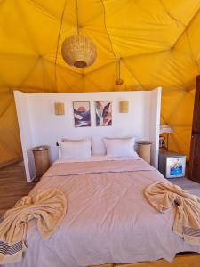Letto o letti in una camera di Timlalin Dome