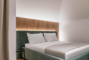 Postel nebo postele na pokoji v ubytování Mae Select Hotel
