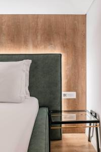 Postel nebo postele na pokoji v ubytování Mae Select Hotel