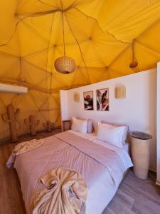 Letto o letti in una camera di Timlalin Dome