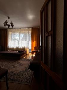 Postel nebo postele na pokoji v ubytování Pokoje Gościnne AMBER