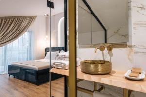 Postel nebo postele na pokoji v ubytování Mae Select Hotel