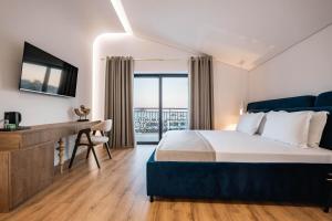 Postel nebo postele na pokoji v ubytování Mae Select Hotel