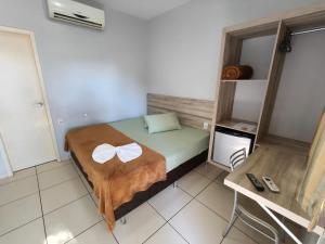 Postel nebo postele na pokoji v ubytování Hotel Vitória - Guaíra