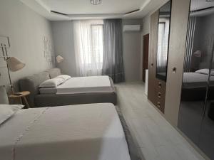 Letto o letti in una camera di Guest House Inn Side