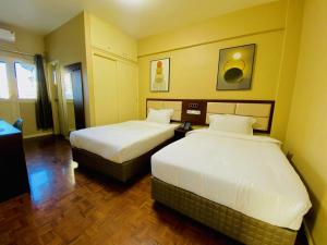 Letto o letti in una camera di Hotel Mirava