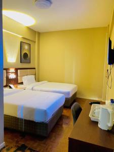 Letto o letti in una camera di Hotel Mirava