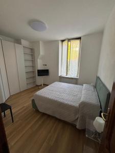 Postel nebo postele na pokoji v ubytování CasaPlaya in Vernazhola