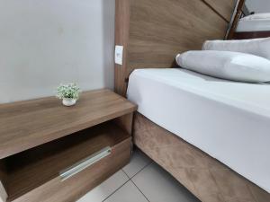Postel nebo postele na pokoji v ubytování Hotel Vitória - Guaíra