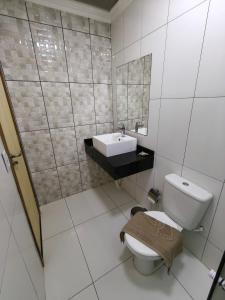Koupelna v ubytování Hotel Vitória - Guaíra