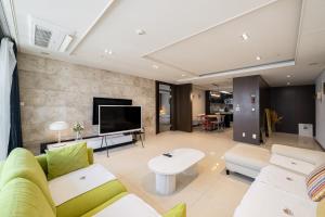 Μια τηλεόραση ή/και κέντρο ψυχαγωγίας στο On the Beach for big family & Bexco