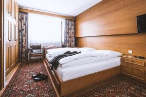 Postel nebo postele na pokoji v ubytování Pension Neururer