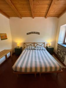 A bed or beds in a room at Agriturismo Giandriale