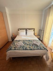 Postel nebo postele na pokoji v ubytování Duplex - vue sur la Seine au centre ville de Vernon