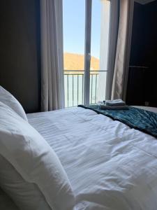 Postel nebo postele na pokoji v ubytování Duplex - vue sur la Seine au centre ville de Vernon + 3 fotografie