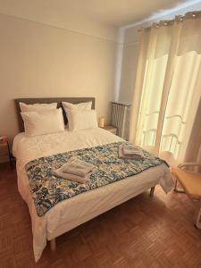 Postel nebo postele na pokoji v ubytování Duplex - vue sur la Seine au centre ville de Vernon