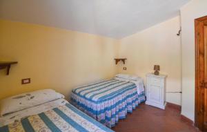 A bed or beds in a room at Il Frantoio