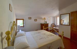 A bed or beds in a room at Il Frantoio