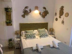 Postel nebo postele na pokoji v ubytování Apartamentos Strand Jávea