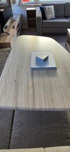 a book on a coffee table in a living room at Ocean Edge 13 in Heysham +17 photos