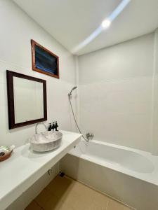 Ein Badezimmer in der Unterkunft Pen's Bungalow Koh Phangan