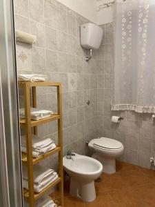 Koupelna v ubytování Appartamenti Sole Mare Agropoli + 44 fotografií