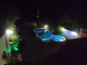 Der Swimmingpool an oder in der Nähe von Casa na Barra do Una, à beira do Rio Una e frente a Praia