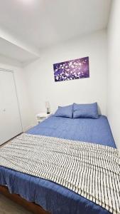 Postel nebo postele na pokoji v ubytování Joyce Place Walk to Shops, Stay in Comfort + 23 fotografií