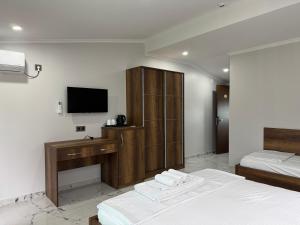 Postel nebo postele na pokoji v ubytování Magnetiti Hotel + 37 fotografií