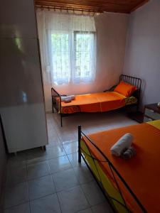 Postel nebo postele na pokoji v ubytování VIRGINIA house