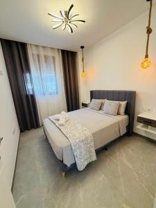 Postel nebo postele na pokoji v ubytování Calpe apartamento LUXURY 2 min playa aparcamiento patio piscina aire wifi