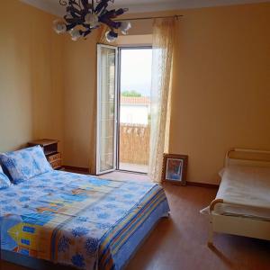 Ένα ή περισσότερα κρεβάτια σε δωμάτιο στο CirceoMARE