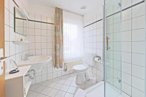 Koupelna v ubytování Hotel Hülsmann Garni