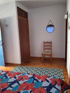 Ένα ή περισσότερα κρεβάτια σε δωμάτιο στο Apartamento das escadinhas T0