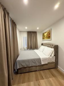 a bedroom with a bed in a room at Luxury Sovereign House in Brighouse