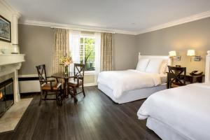 Postel nebo postele na pokoji v ubytování Hotel Metropole