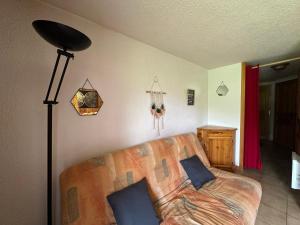 Część wypoczynkowa w obiekcie Appartement cosy à Morillon, proche lac Bleu, terrasse sud, 4 pers, piste ski bus, sans internet - FR-1-642-69