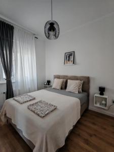 Katil atau katil-katil dalam bilik di Apartman Rakanović