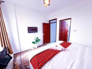 Ngong Hills View客房内的一张或多张床位