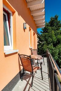Balkón nebo terasa v ubytování Appartementhaus mit Balkon im Ostseebad Göhren VM