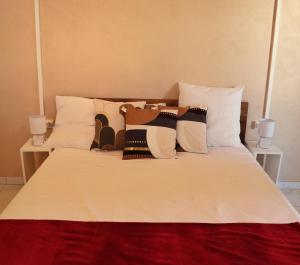 Una cama o camas en una habitación de Cocon zen