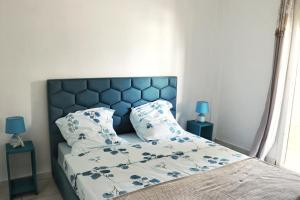 Una cama o camas en una habitación de Cocon zen