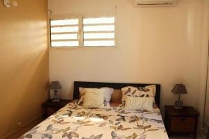 Una cama o camas en una habitación de Cocon zen